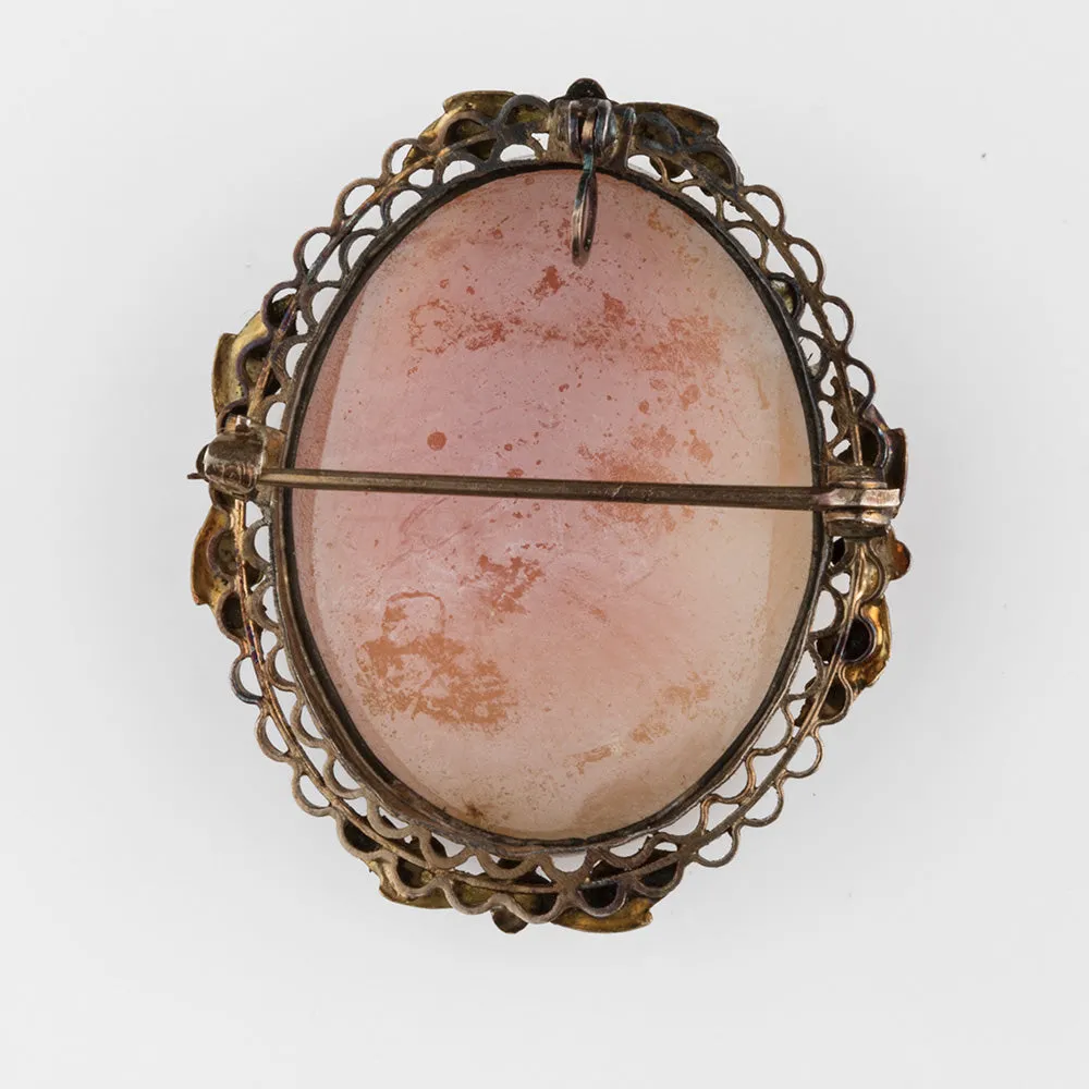 Edwardian conch shell cameo brooch - pendant  in a gold washed filigree setting. pned483